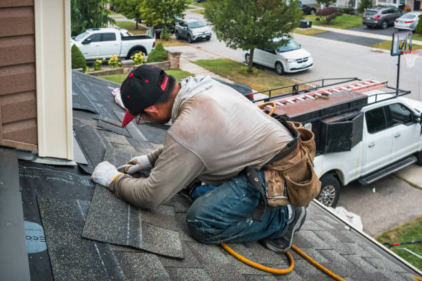 Professional Roofing technician working in Thompsonville, MI